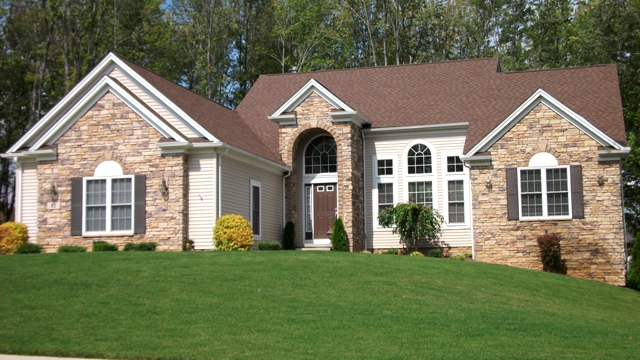 Jack and Jill bedrooms 2 & 3. High vaulted ceilings in foyer, great room, and kitchen. Large cathedral breakfast room. Master suite with optional cathedral ceiling. Formal dining room with tray ceiling. 1st floor utility. Optional 2nd floor loft/bedroom (adds 208 sq. ft.). Covered arched entry. Side-entry 2-car garage.