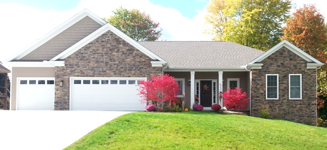 Vaulted/Cathedral foyer and great room. Kitchen with large walk-in pantry. Dinette with sunroom off back. Large master bed and bath. Covered front porch with columns. 3 car front entry garage, Optional side entry, Optional Brick & Stone Front.